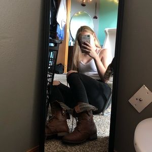 Combat boots with trouble printing on sides